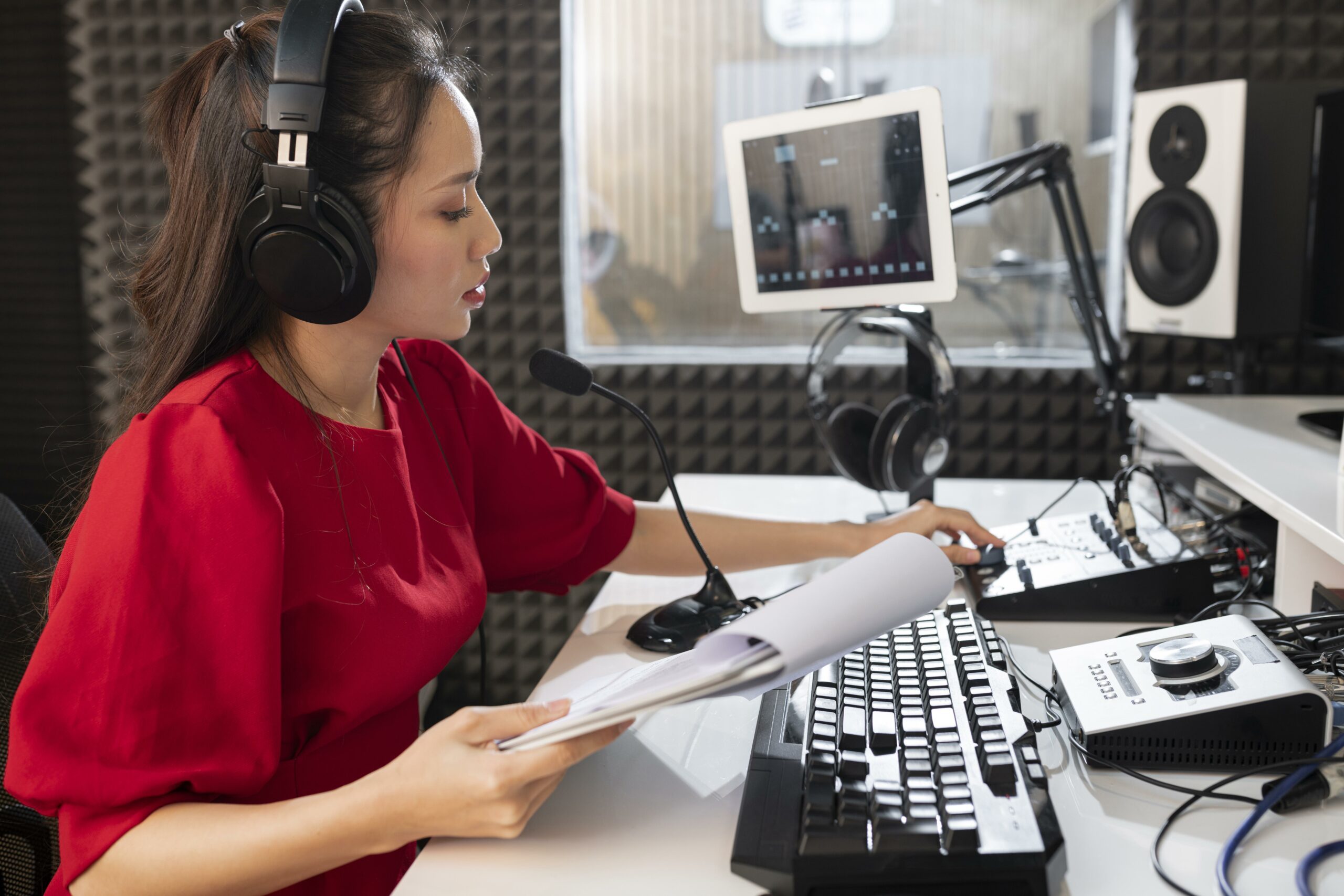 woman-working-radio-with-professional-equipment